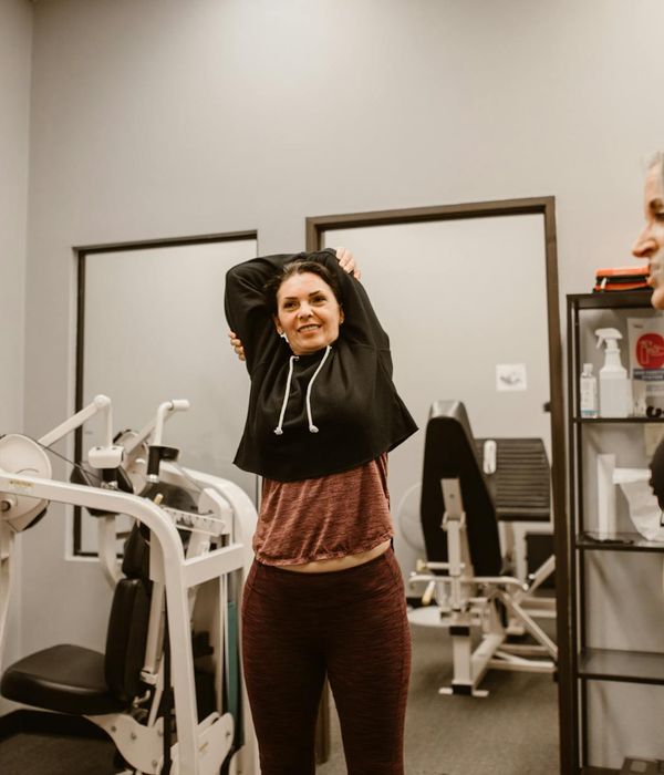 A person stretching gently, feeling energized and balanced.